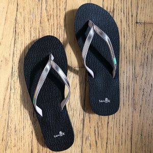 Rose gold Sanuk flip flops